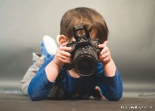 boy taking photo